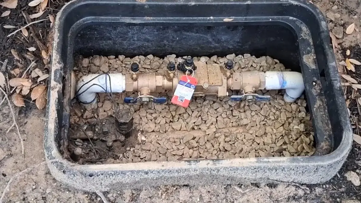 Backflow preventer assembly being tested and serviced for Winterizing Your Castle Rock Irrigation System and Backflow Preventer Before First Freeze