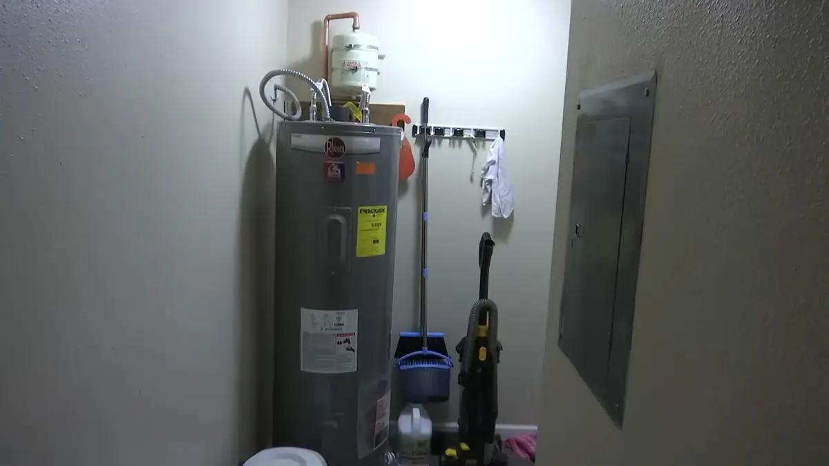 Gas water heater inspection in a utility room for Water Heater Lifespan at Altitude: Why Castle Rock Heaters Die Younger