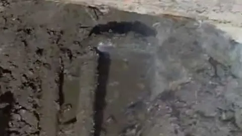 Opened concrete floor exposing plumbing during slab leak repair for Castle Rock Plumbing Blog