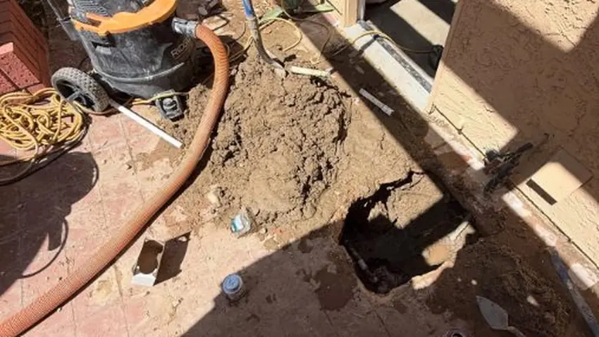 Opened concrete floor exposing plumbing during slab leak repair for Plumber in Castlewood Ranch, Castle Rock, CO