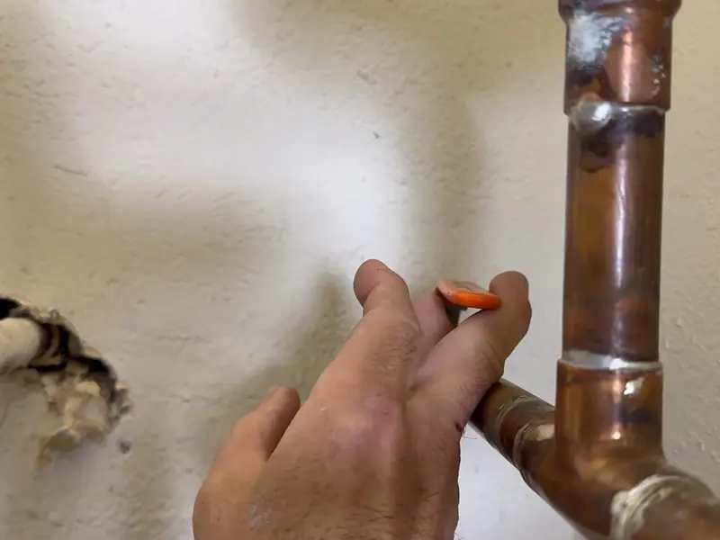 Opened concrete floor exposing plumbing during slab leak repair for Leak Detection in Castle Rock, CO | Electronic & Acoustic