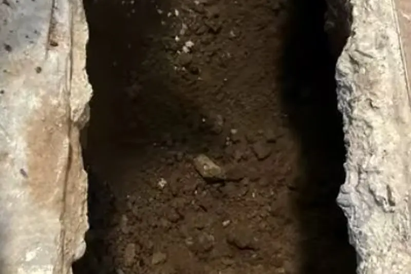 Opened concrete floor exposing plumbing during slab leak repair for Plumbing Services in Castle Rock, CO | 24/7 Emergency Plumber